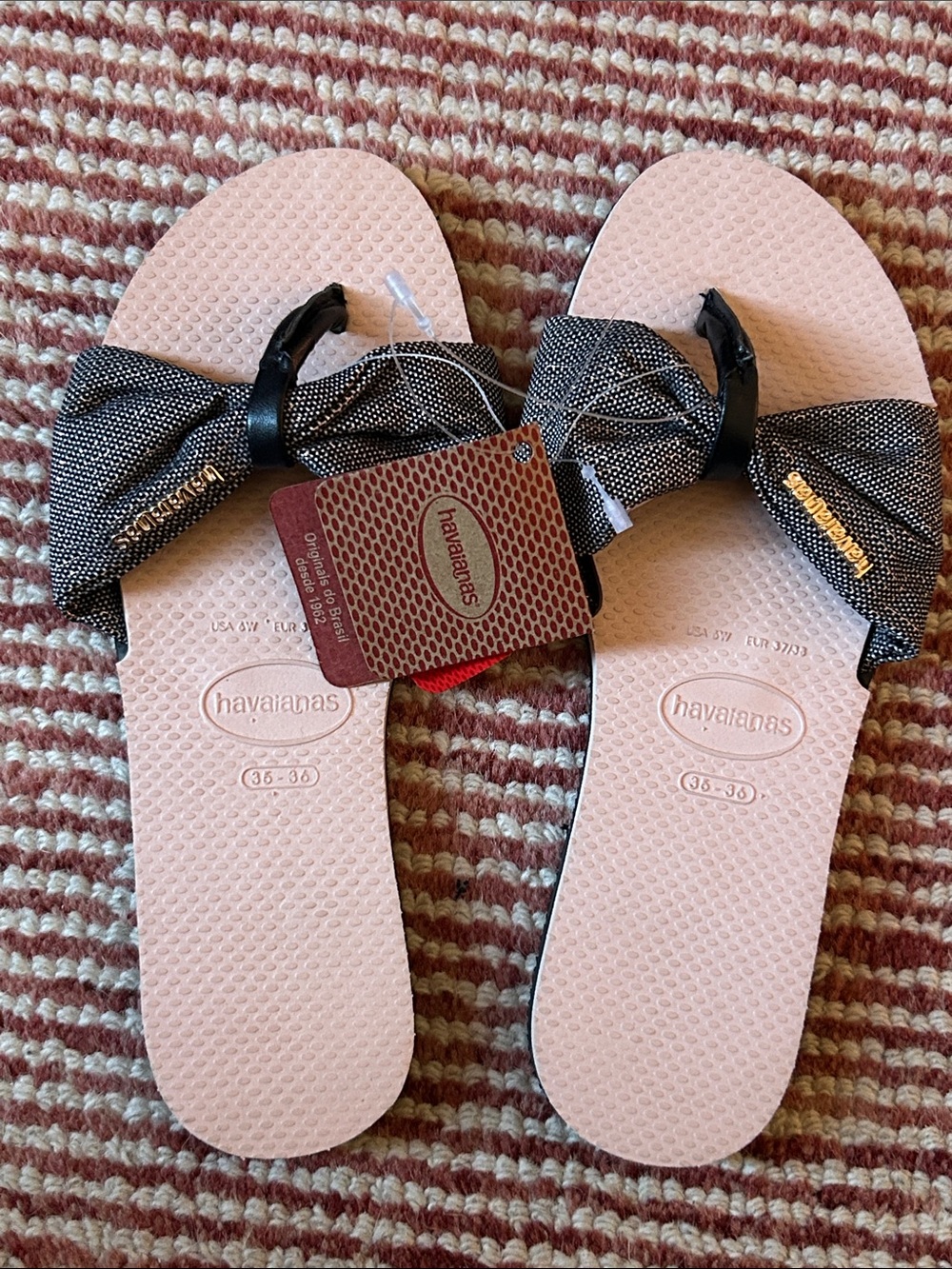 Havaianas Pink Flip Flops with Black Bow Straps